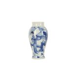 A CHINESE BLUE AND WHITE 'LADIES' VASE.