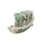 A RARE CHINESE FAMILLE VERTE BISCUIT MODEL OF A PLEASURE BOAT.