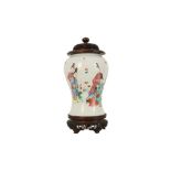 A CHINESE FAMILLE ROSE 'LADIES AND BOYS' VASE.