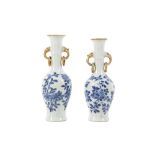 A NEAR-PAIR OF CHINESE BLUE AND WHITE VASES.