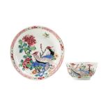 A CHINESE FAMILLE ROSE 'PHEASANTS' TEA BOWL AND SAUCER.