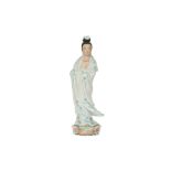 A CHINESE PORCELAIN MODEL OF GUANYIN.