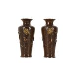 A PAIR OF JAPANESE INLAID BRONZE VASES.