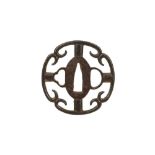 AN IRON SUKASHI TSUBA.