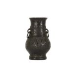 A CHINESE BRONZE ARCHAISTIC VASE.