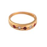 A FIVE STONE RUBY AND DIAMOND RING