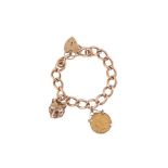 A 9 CARAT GOLD CHARM BRACELET