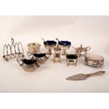 A quantity of silver cruets, a silver toast rack etc,