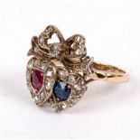 A ruby, sapphire and diamond ring, converted from a 19th Century sweetheart brooch,
