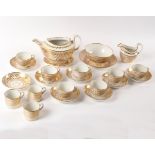 A John Rose Coalport gilt and white part tea and coffee service,