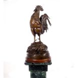 After Auguste Nicholas Cain (1822-1894)/Le Reveil/a bronze study of a rooster standing on a