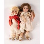 A SFBJ Paris bisque head doll with composition jointed body, 41cm long and another doll,