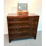 A George III mahogany chest of three long and two short drawers, on splay feet,