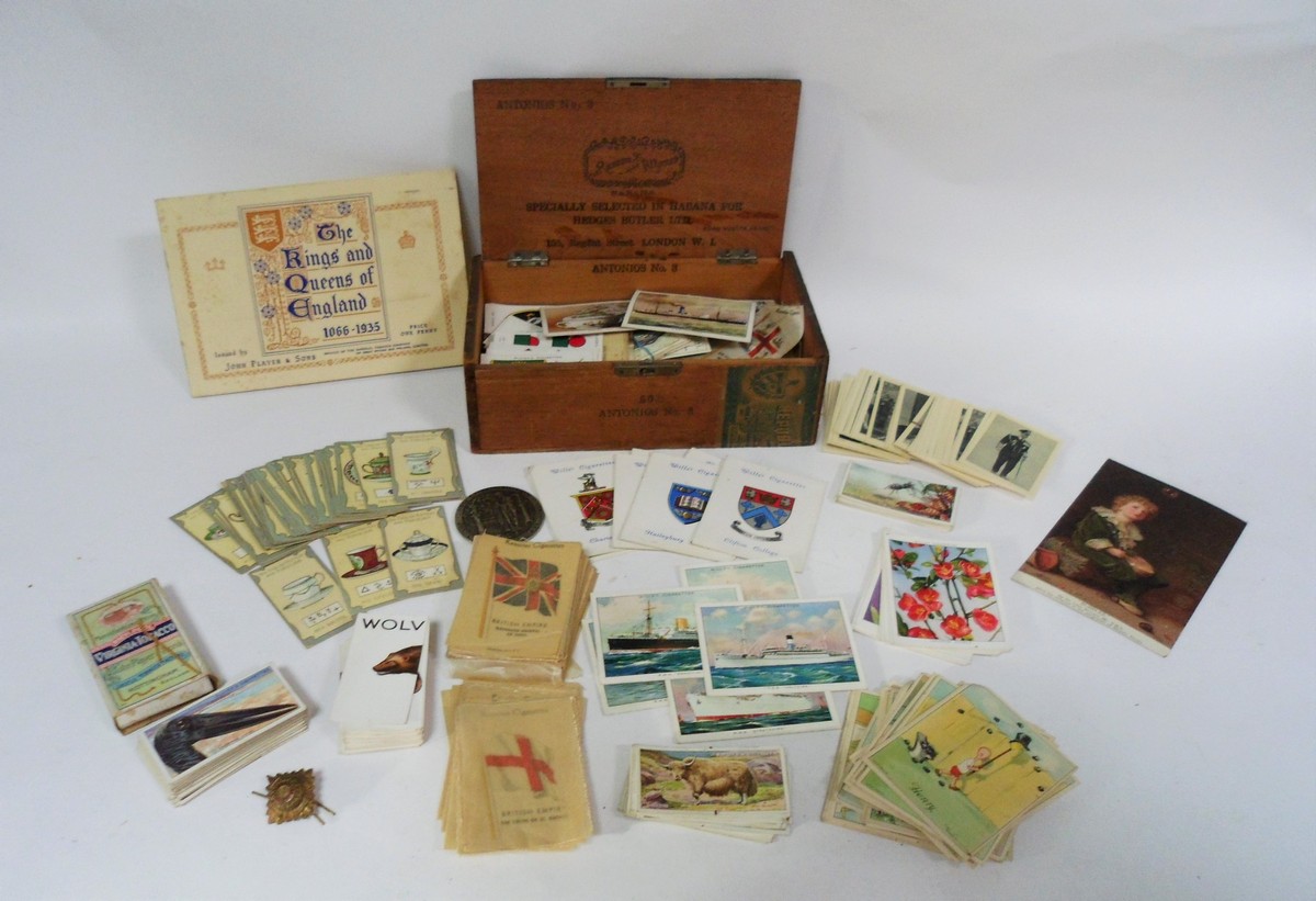 A quantity of cigarette cards including J Wicks & Sons Ltd.