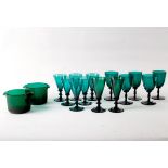 A quantity of green glasses and two glass rinsers