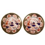 A pair of Swansea dessert plates, painted in the Japan Gazebo pattern, one with red printed mark,