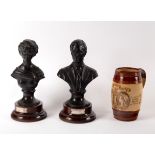 A pair of Wedgwood black basalt busts of the Queen and the Duke of Edinburgh and a Queen Victoria