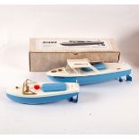 A Sutcliffe blue painted tiger clockwork speed boat and a Sutcliffe Diana clockwork cruiser,