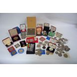 A large quantity of commemorative and proof coins including Royal Commemorative,