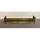 A brass fire curb,