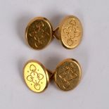 A pair of 18ct gold cufflinks, each with quatrefoil design to the oval plaques,