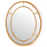 A George III giltwood oval mirror,