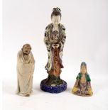 A Chinese pottery figure of a Luohan,