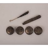 Four Continental circular silver buttons, Berthold Muller, import marks for Chester 1906,