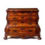 A Dutch floral marquetry chest of bombé shape, fitted four long drawers on ball and claw feet,