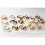 A group of twenty-eight English porcelain teacups and saucers,