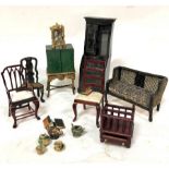 A small quantity of dolls house furniture including an ebonised chinoiserie bureau bookcase,