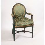 A green painted open armchair with oval back