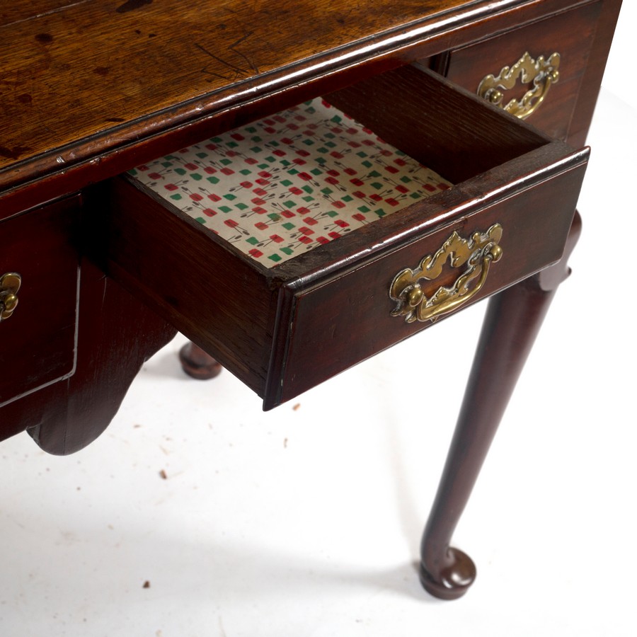 A George II mahogany three-drawer side table, circa 1740, on cabriole legs with pad feet, - Image 3 of 3