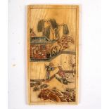 A Chinese carved ivory panel, late Qing dynasty, from a table screen,
