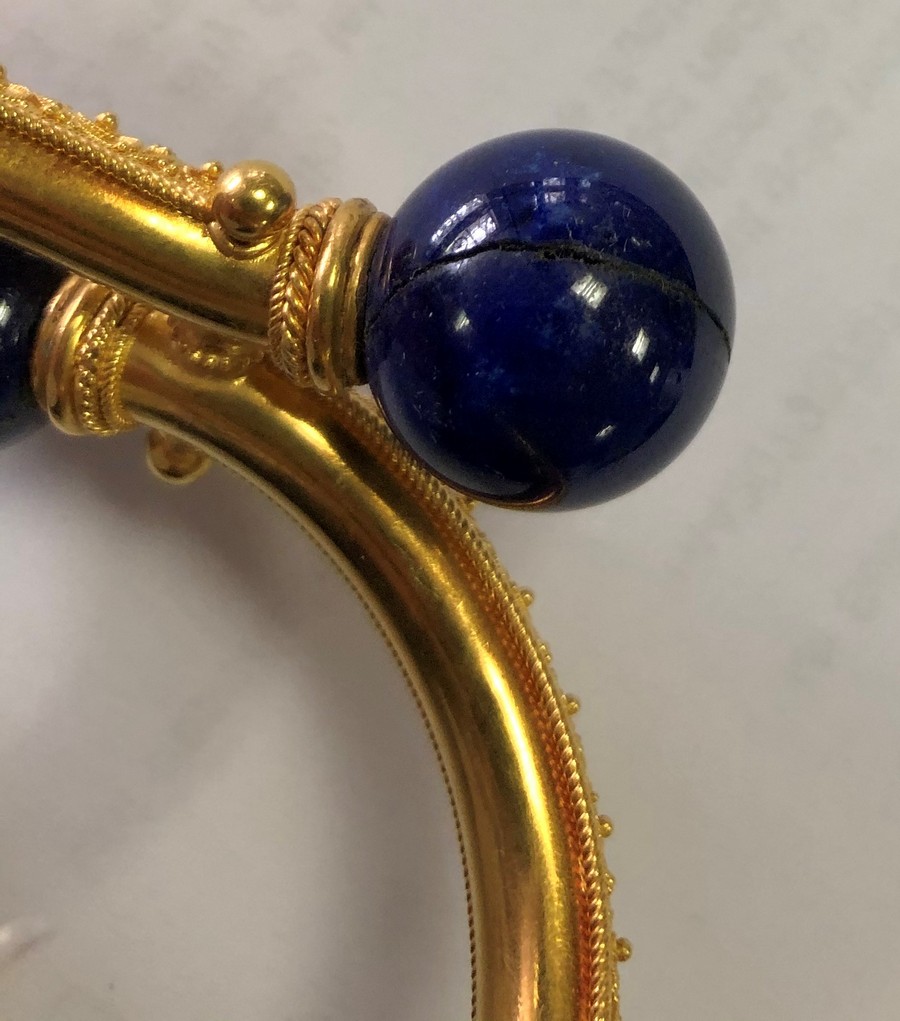 An Archaeological revival gold and lapis lazuli bangle, circa 1870, - Image 2 of 5