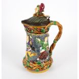 A Minton majolica tower jug, circa 1880, impressed marks, with a pewter mounted hinged cover,