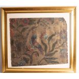 A framed 18th Century leather panel, painted a parrot in flowering branches in the Jacobite style,