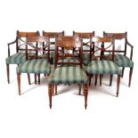 A set of eight George IV mahogany dining chairs with x-shaped splat backs,