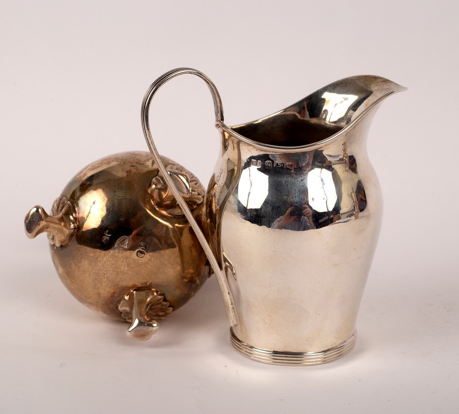 A Victorian silver baluster cream jug, London 1855, 11cm high and another, George Unite, - Image 2 of 2