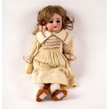 A Simon & Halbig 43, for Kammer Reinhart, bisque head doll with sleepy eyes, open mouth with teeth,