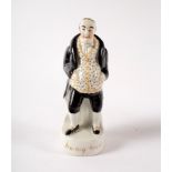 A named Staffordshire figure 'Jemmy Wood' with black suit and green and red speckled waistcoat,