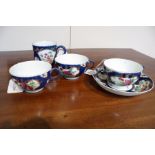 Three Worcester blue scale ground teacups and a saucer, circa 1770,