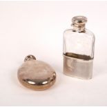 An oval silver hip flask, Birmingham 1900, with screw off cover,