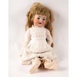 A Simon & Halbig for Kramer & Reinhart bisque head doll with sleepy eyes,