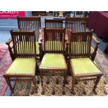 A set of six Edwardian mahogany rail back chairs in the manner of James Peddle,