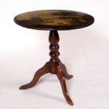 A circular table, the top painted a scene of figures in boats on a lake and fisherman on shore,