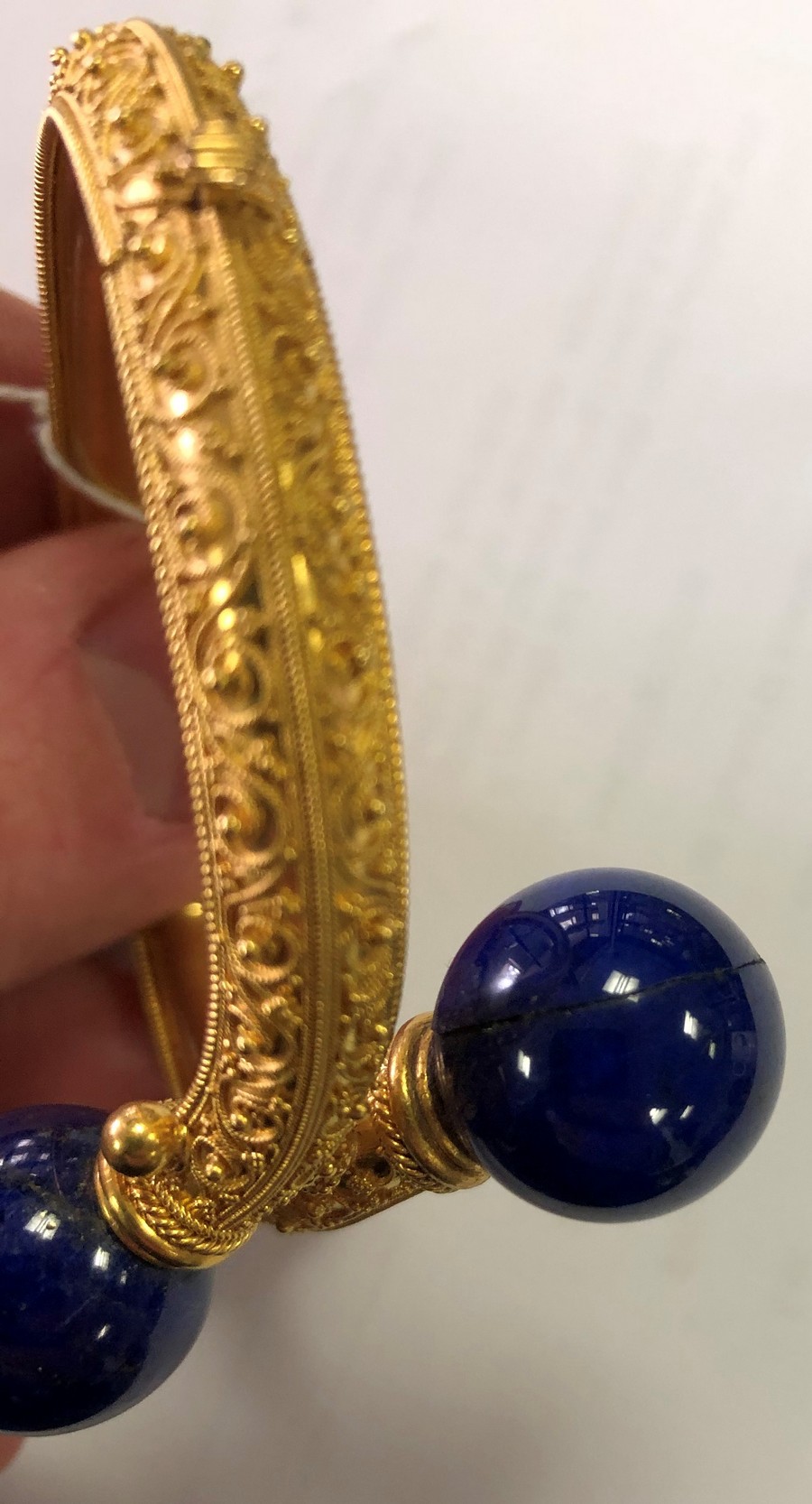 An Archaeological revival gold and lapis lazuli bangle, circa 1870, - Image 3 of 5