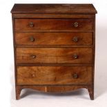 A Georgian mahogany chest of four drawers on splay feet,