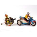 A tinplate motorcycle and sidecar with key and instructions, M570, 18cm long,