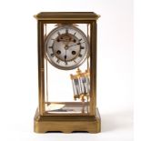 A French four-glass brass mantel clock,